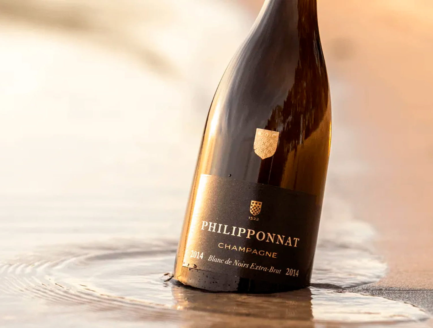 Bouteille de Champagne sur la plage